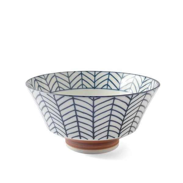 Ceramic bowl with blue and white pattern on a white background
