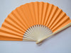 Vibrant orange paper folding fan