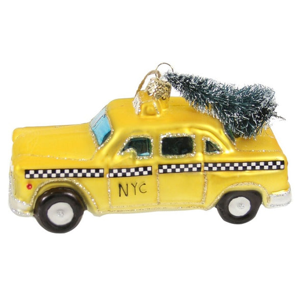 Glass ornament of a NYC taxi cab.