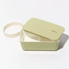 Takenaka Bento Box (Flat) - Pale Olive. Lid is open and dual compartments are shown. Elastic rubber band is on the side.