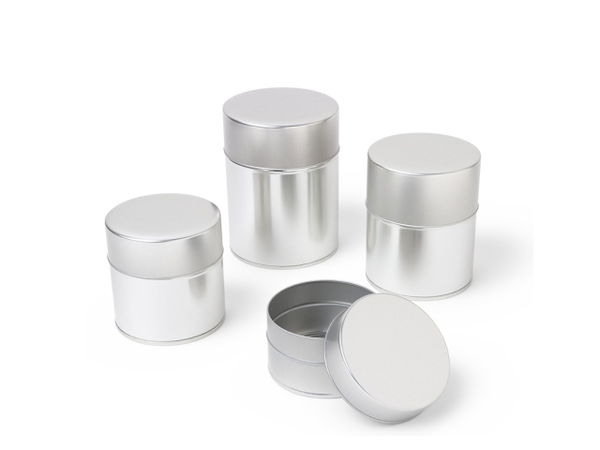 Four Mihon silver tea canister, one opened