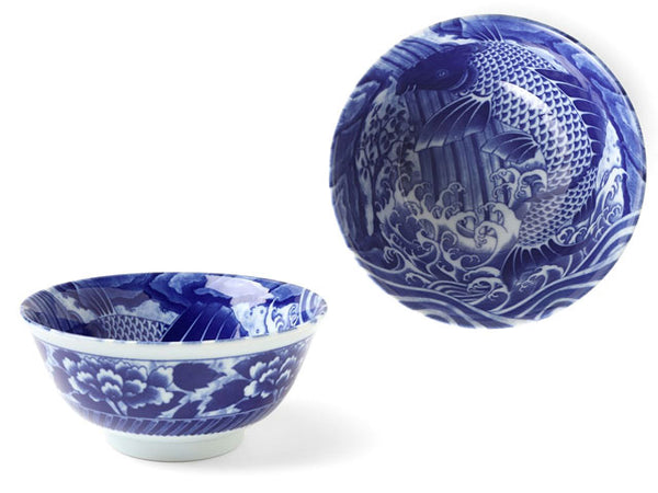Cobalt blue koi fish design. The left depicting the side profile, The right dish shown in an overview shot 