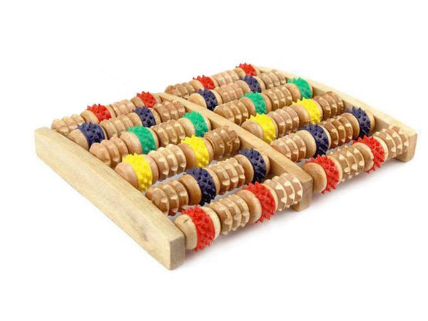 Give your tootsies the royal treatment with this wooden foot roller. Two rows of six rollers each.