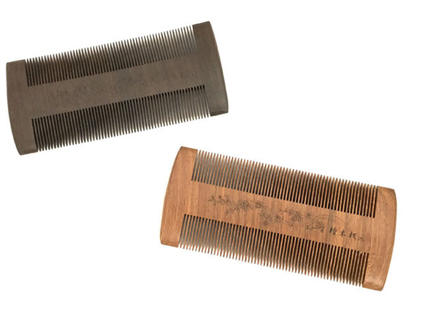 Two double sided wooden comb, each with 58 teeth