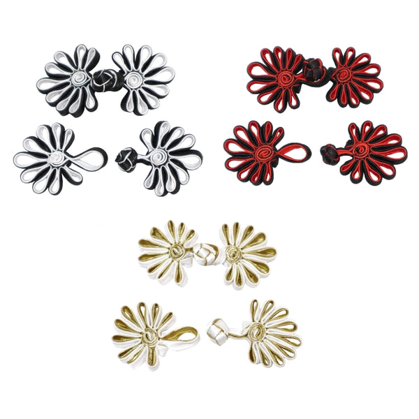 Three pairs floral frog closures. One pair is silver, gold and red