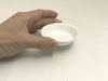 White Ceramic Sauce Dish - Round with hand holding it