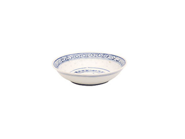 A vintage white sauce dish with dark blue accents around a powerful dragon perfect for any meal