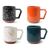 Black/white, Orange, White/Mulit colored and Emerald mugs
