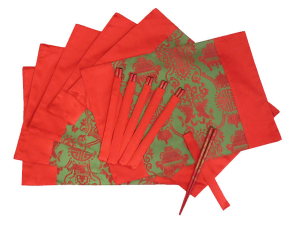 Lovely red and gold placemats with red chopsticks