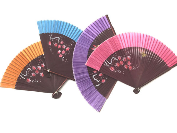 Four floral bamboo framed silk fan. The colors come in orange, light blue, purple and pink