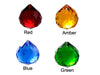 Four crystal balls without red string. Each in a different color, ranging from red, amber, blue, and green
