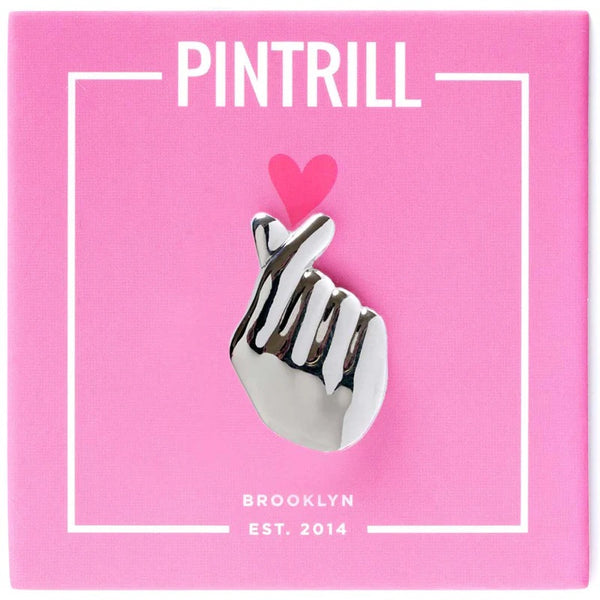 Pintrill finger heart pin on pink backing with dark pink heart