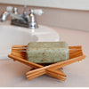Folding soap dish with soap by sink