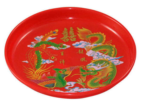 Festive round red tray with brightly colored dragon and phoenix, and gold double happiness character