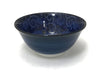 Alluring dark blue bowl with lighter blue curling vines and leaves design