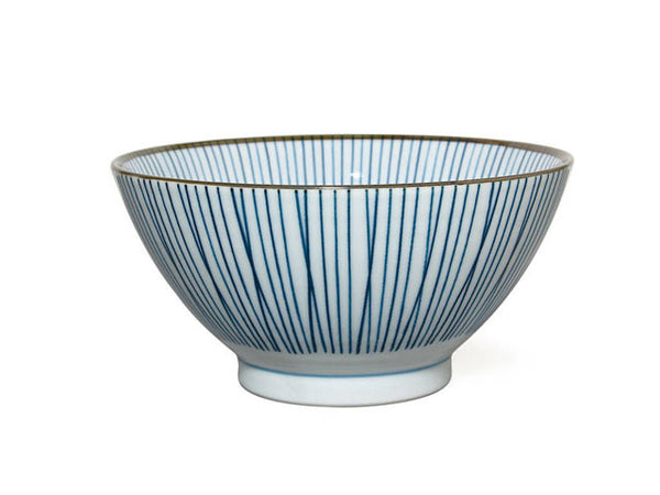 Blue on white noodle bowl with intersecting line pattern.