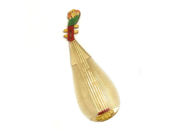 Double sided horn comb - pipa design instrument
