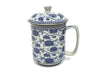 Blue on white mug with floral and vine design