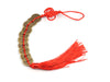 coin ornament with red tassel containing ten coins