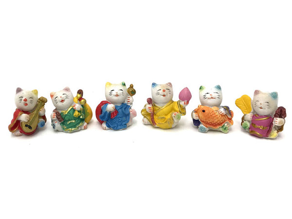 Set of 6 colorful mini lucky cat in assorted colors and poses taken off of the wooden stand