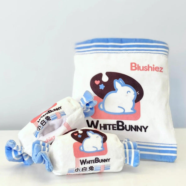 White Bunny Candy Sneak-Treat Dog Toy: mostly white bag and white candy pieces with pink and blue illustration for white bunny candy
