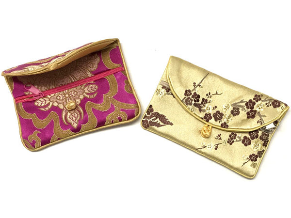 Brocade Coin Purse in assorted styles. Left purse is fuchsia with floral design and right purse is golden yellow with plum blossom design.