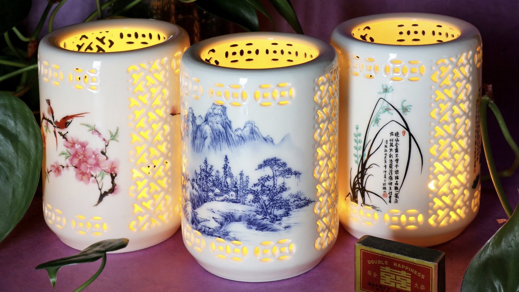 Three ceramic tea light holders
